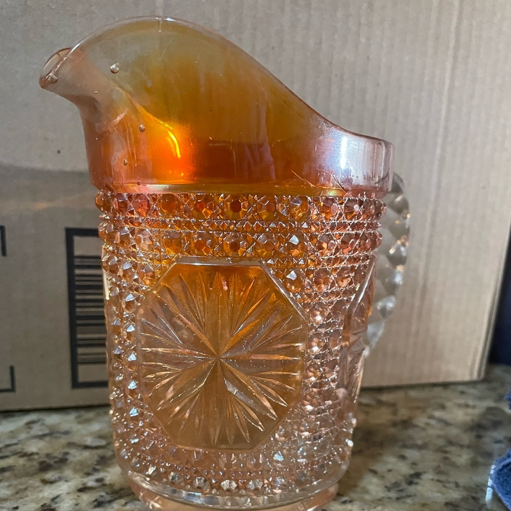 Carnival glass pitcher